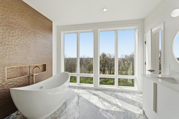 Primary bath with large windows