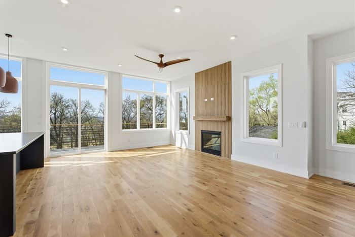 Living area with fireplace and windows